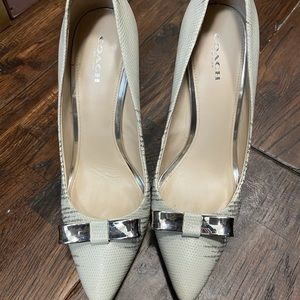 Coach with silver bow detail